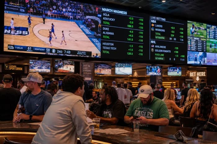 スポーツバーの賭けオッズ表示